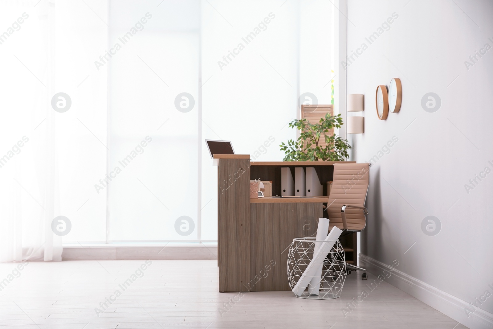 Photo of Hotel lobby interior with wooden reception desk