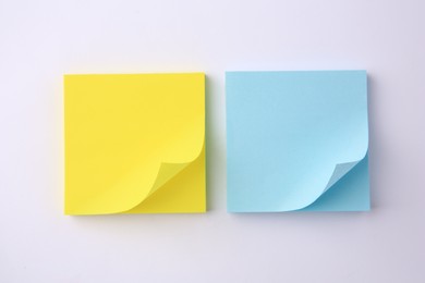 Photo of Blank paper notes on white background, flat lay