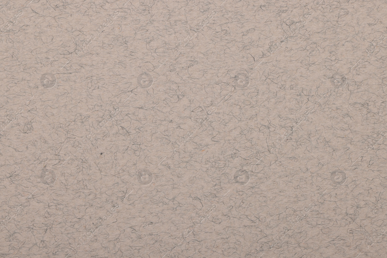 Photo of Texture of light grey paper sheet as background, top view