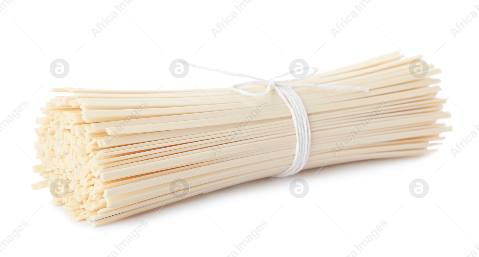 Photo of Bunch of raw rice noodles isolated on white