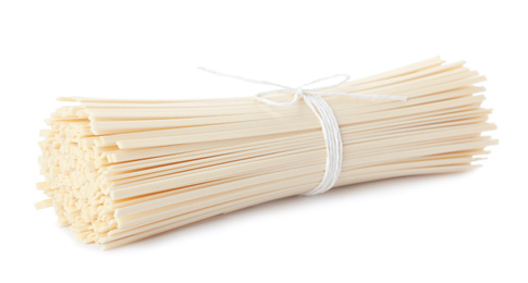 Bunch of raw rice noodles isolated on white