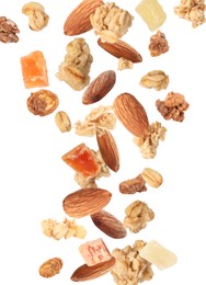 Image of Delicious granola, almonds and dried fruits falling on white background. Healthy snack 