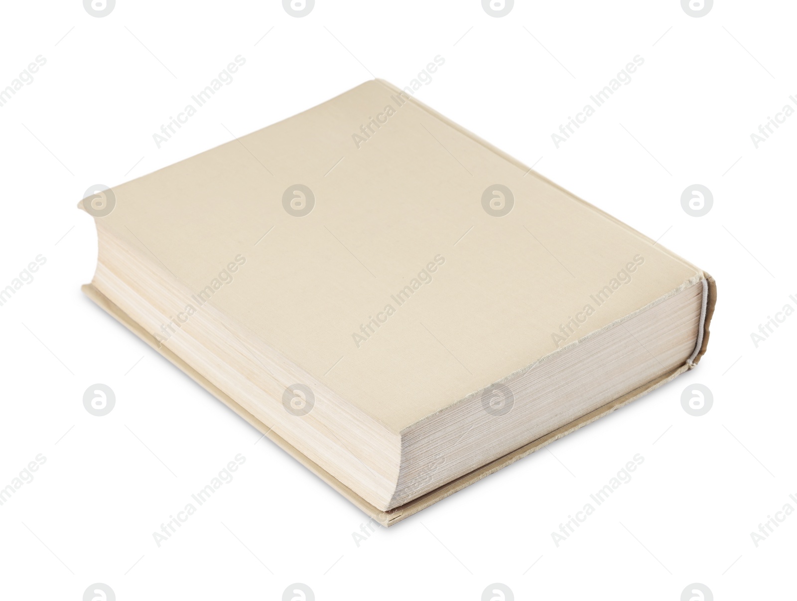 Photo of One closed beige hardcover book isolated on white