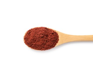 Dried cranberry powder in spoon isolated on white, top view