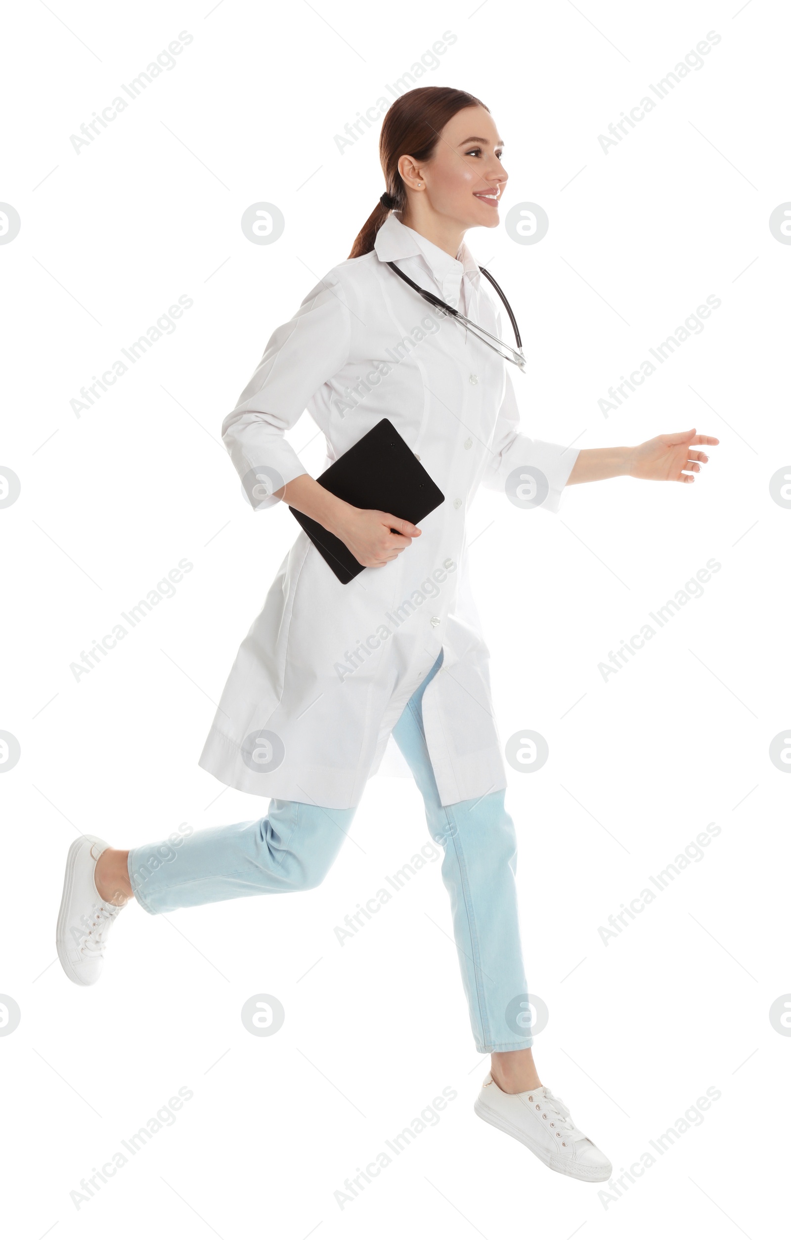 Photo of Doctor with clipboard running on white background