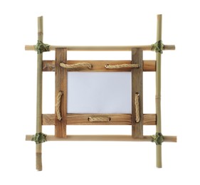 Photo of Empty frame made of bamboo sticks and wooden planks isolated on white