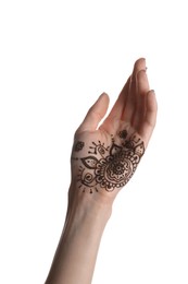 Woman with henna tattoo on palm against white background, closeup. Traditional mehndi ornament