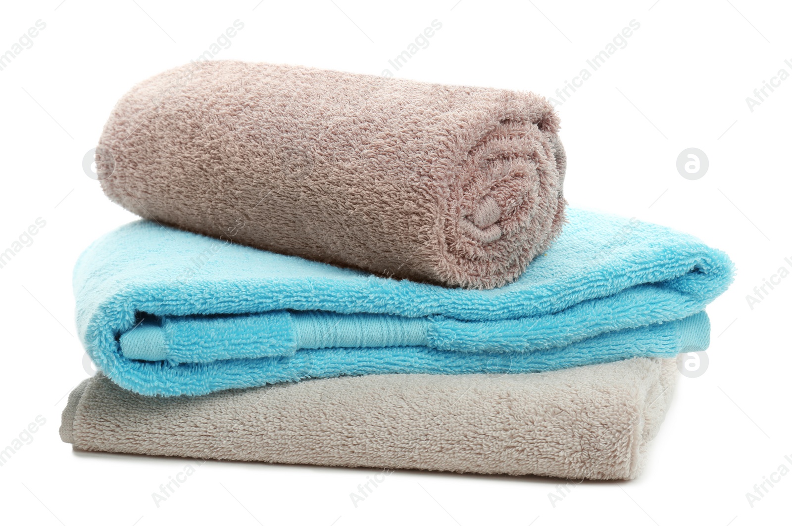 Photo of Clean soft towels on white background