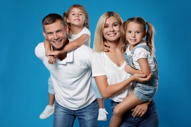 Happy family with children on blue background