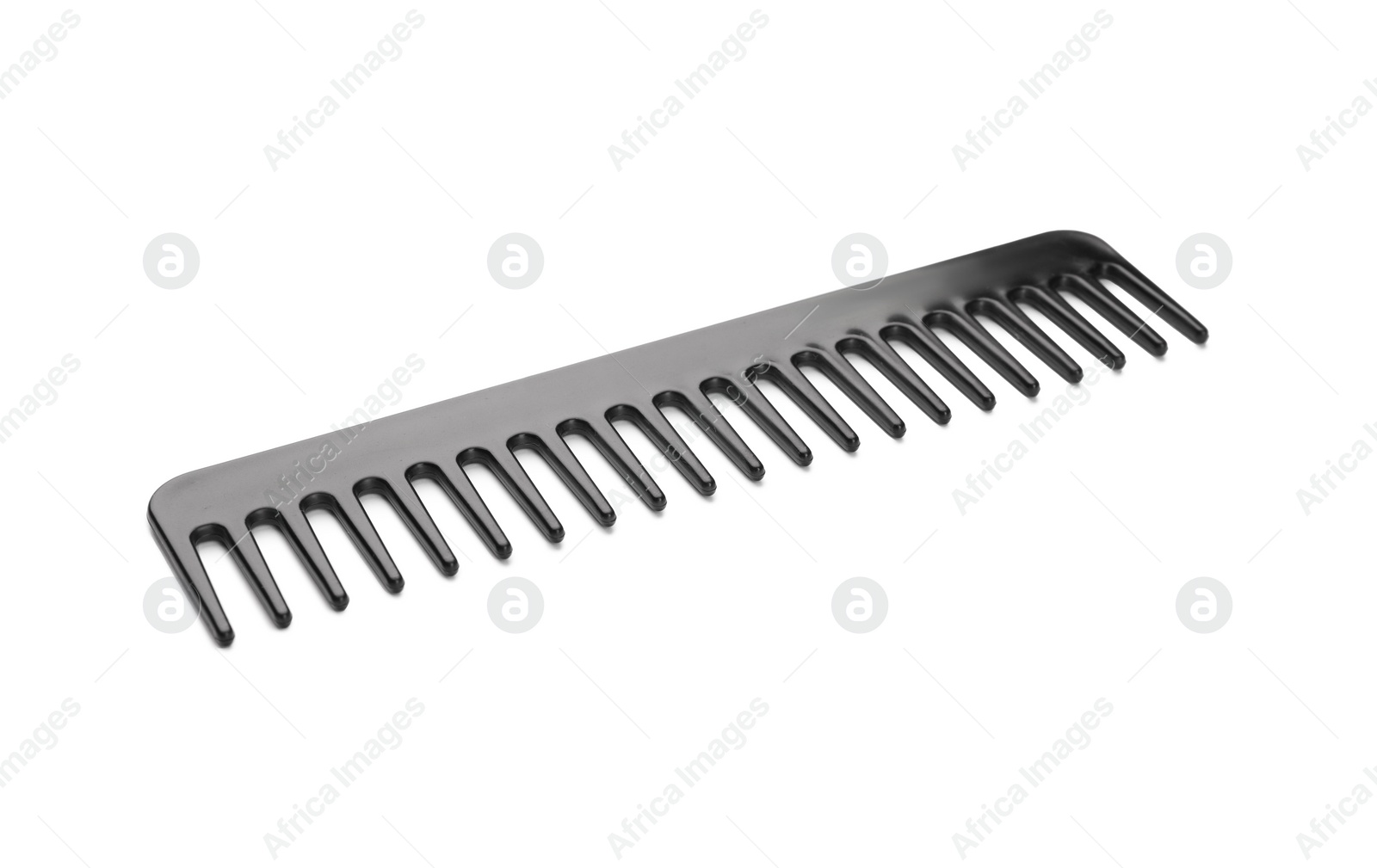 Photo of New plastic hair comb isolated on white