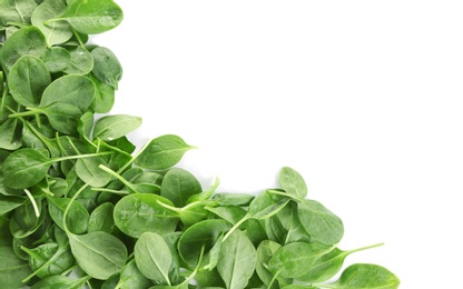 Photo of Pile of fresh green healthy baby spinach leaves on white background