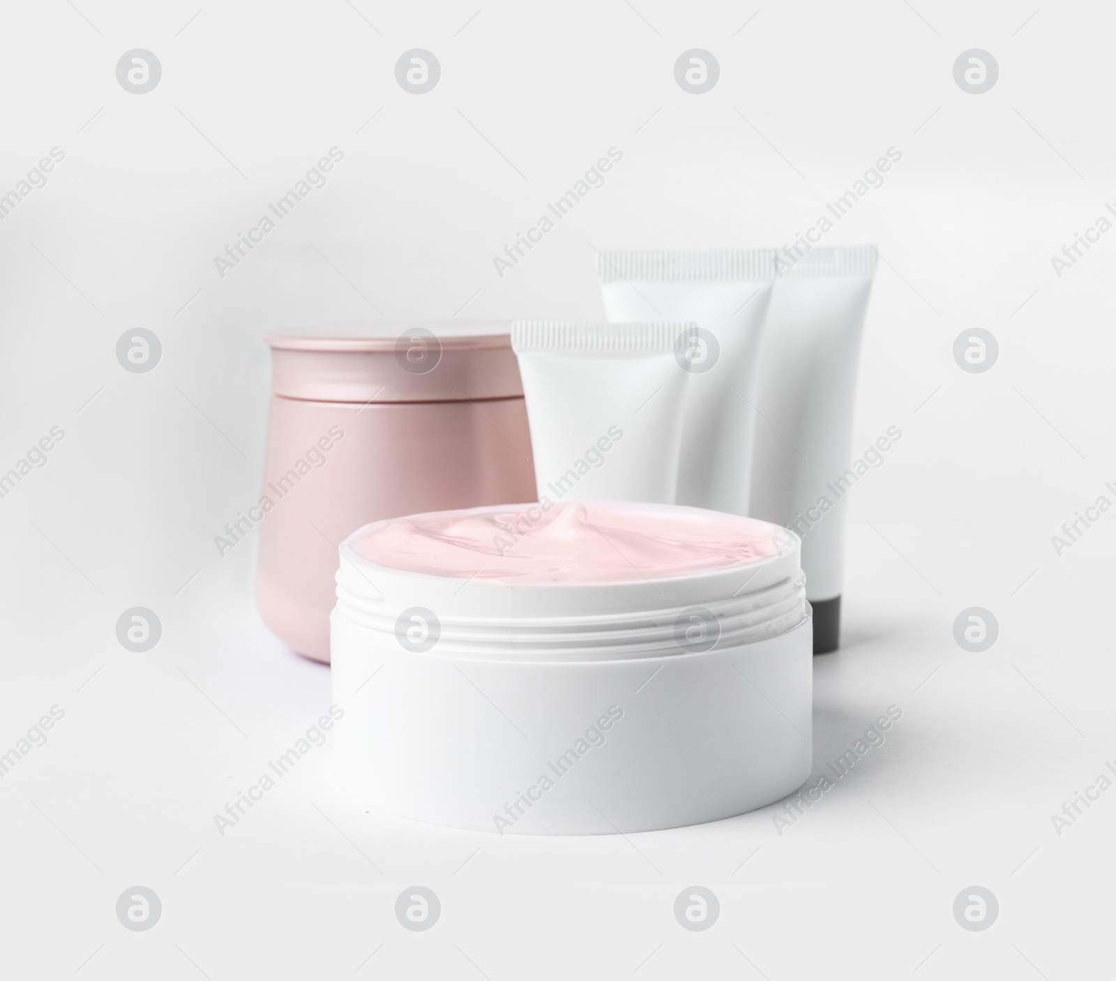 Photo of Different body care products on white background