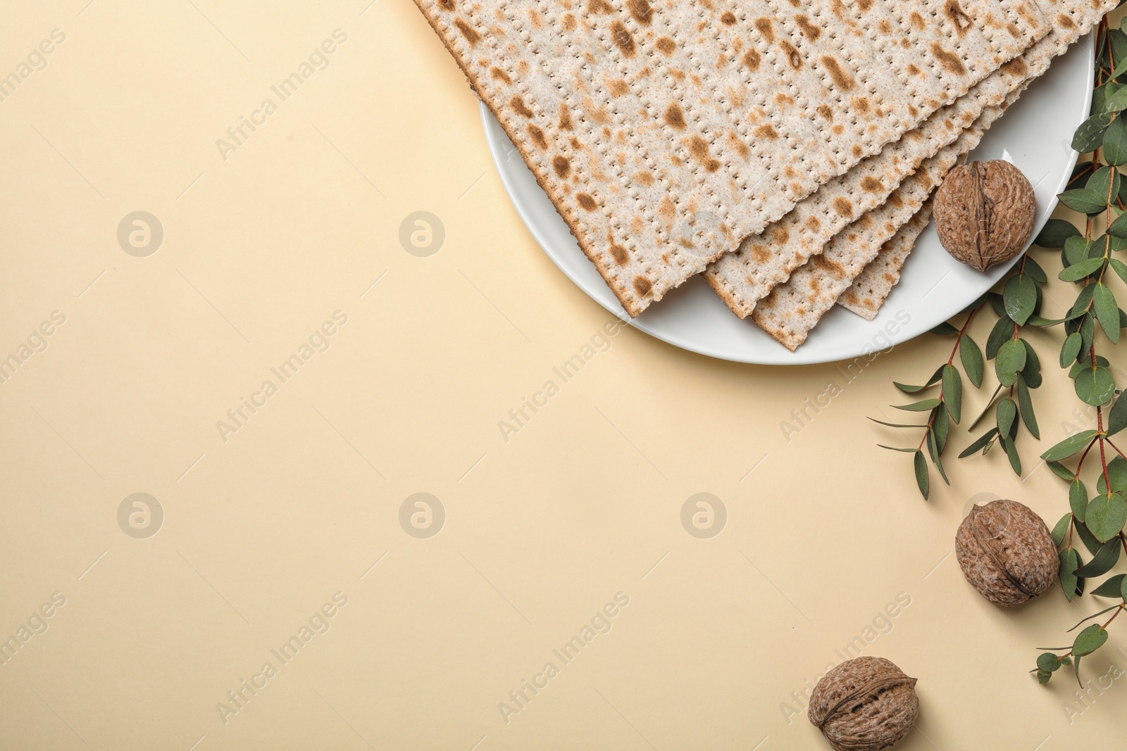 Photo of Flat lay composition with matzo and space for text on color background. Passover (Pesach) Seder