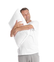 Photo of Man holding soft pillow on white background