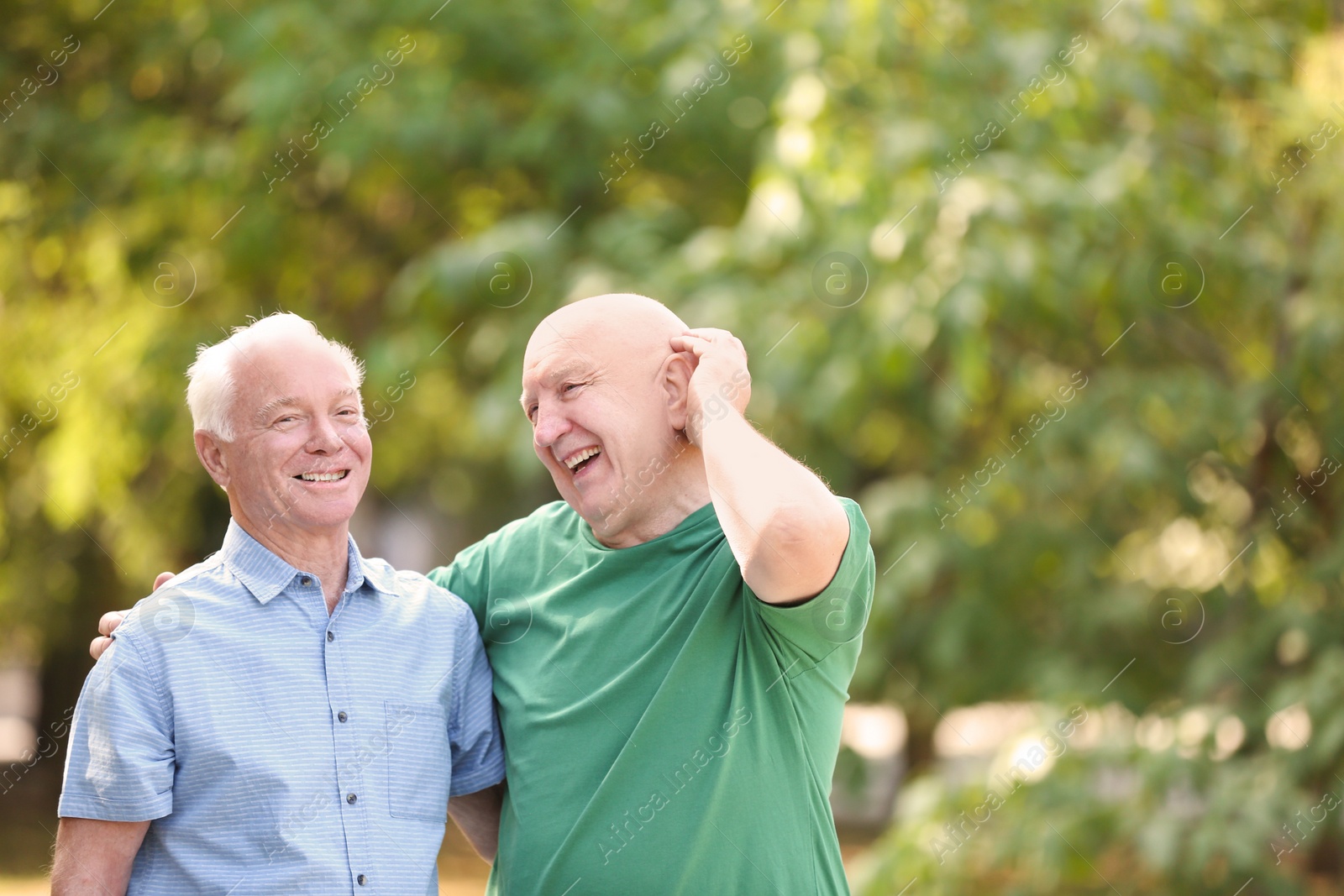 Photo of Elderly men spending time together in park