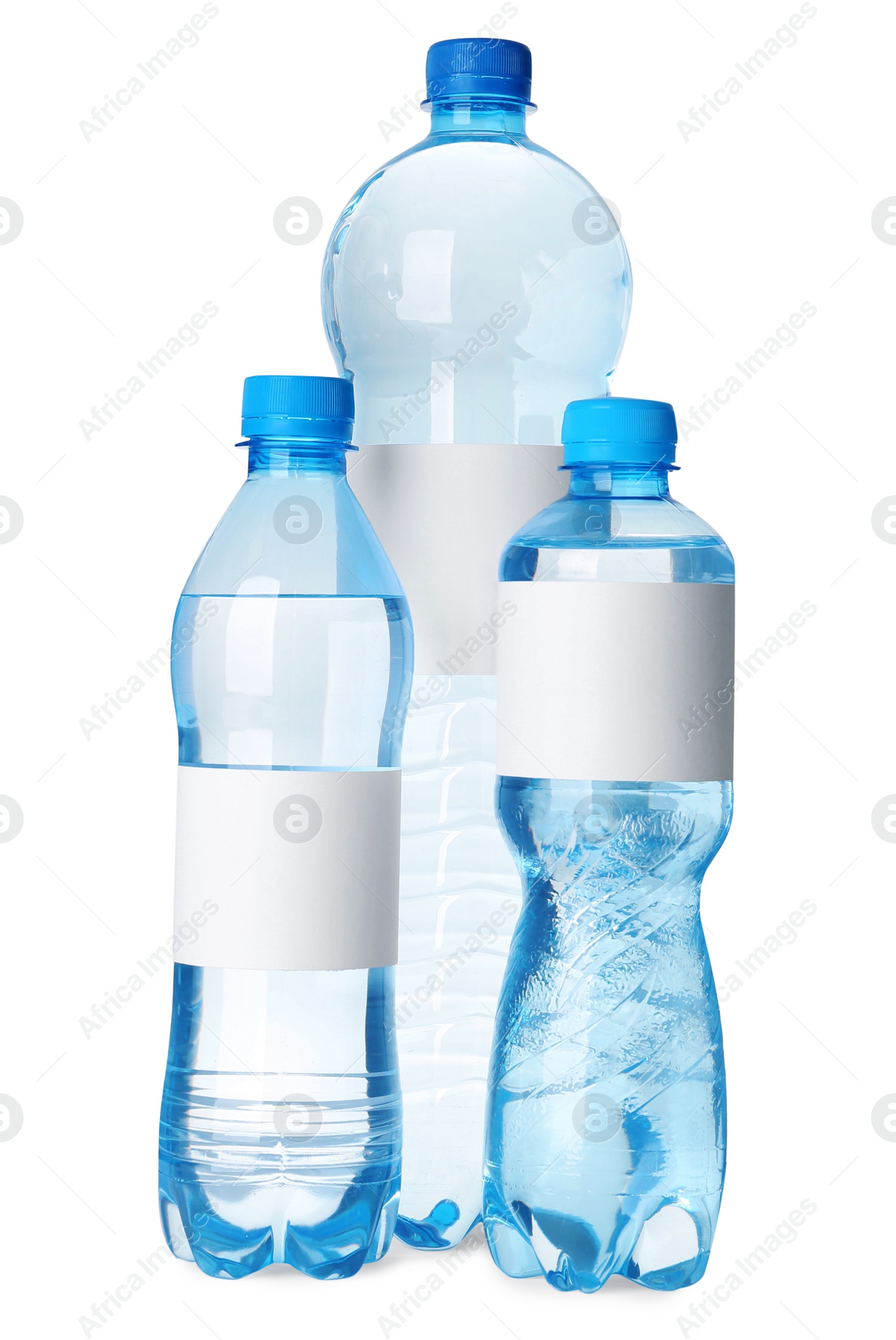 Image of Bottles of pure water with blank labels on white background