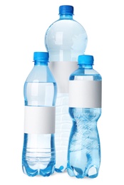Image of Bottles of pure water with blank labels on white background