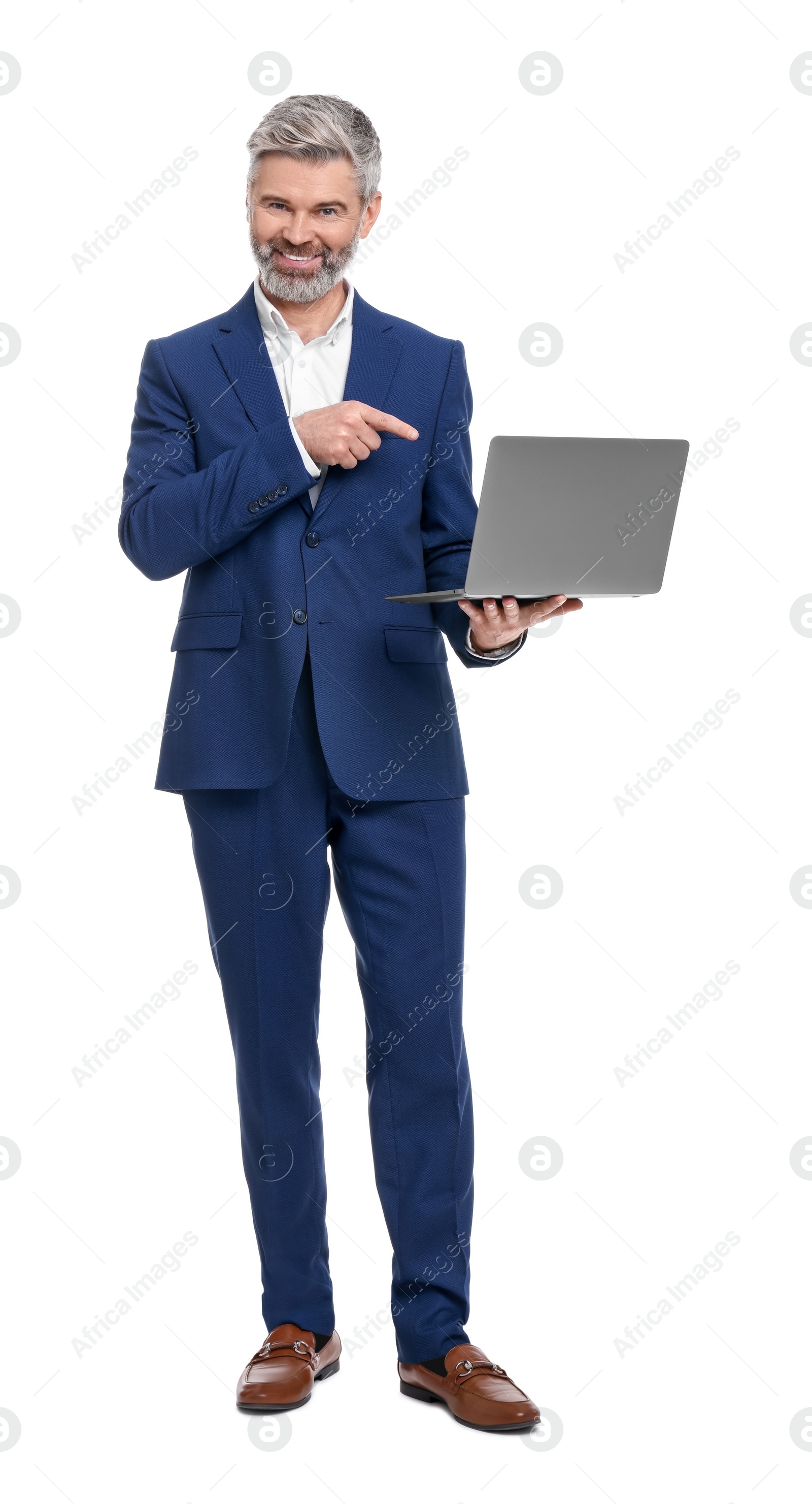 Photo of Mature businessman in stylish clothes with laptop on white background