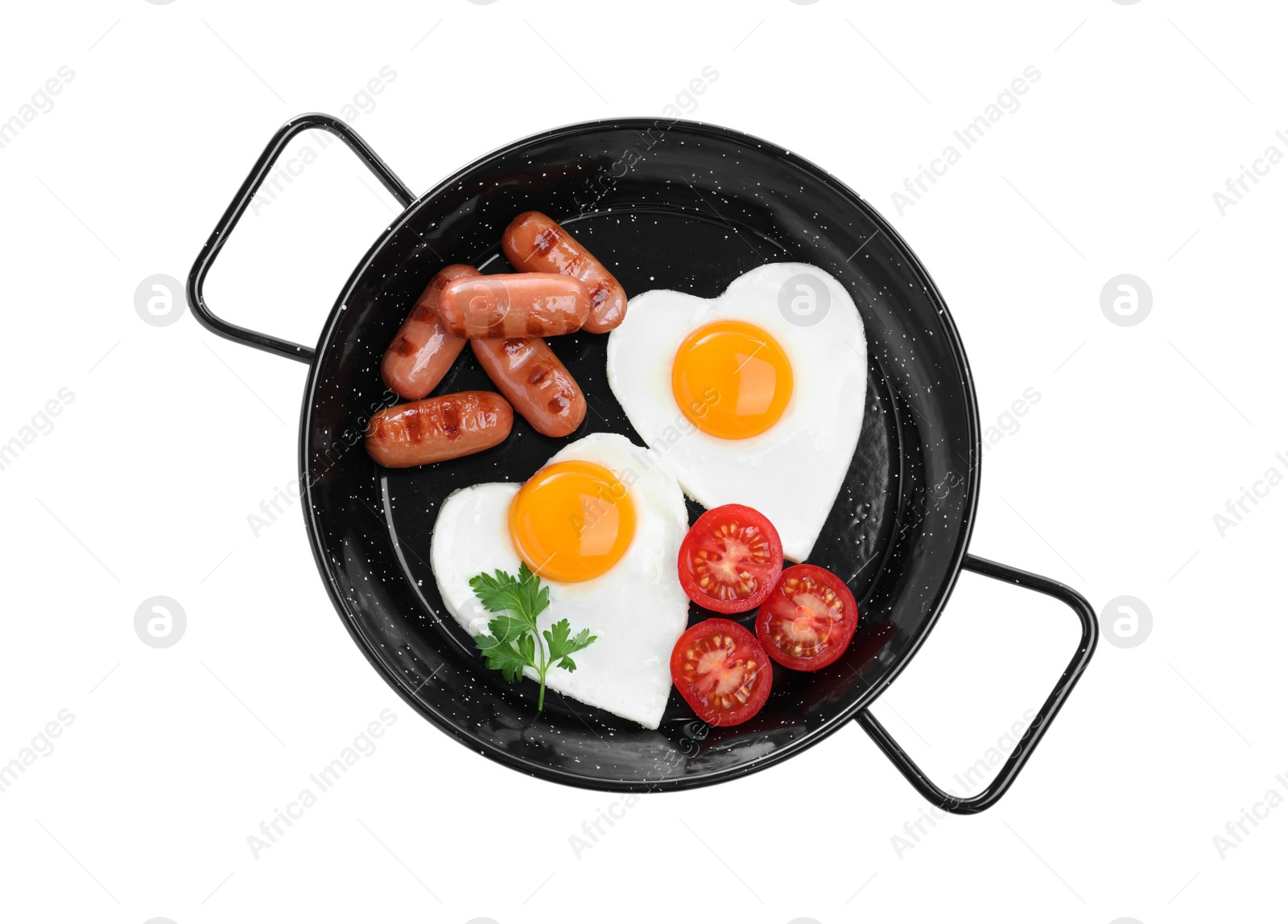 Photo of Romantic breakfast with fried sausages and heart shaped eggs isolated on white, top view. Valentine's day celebration