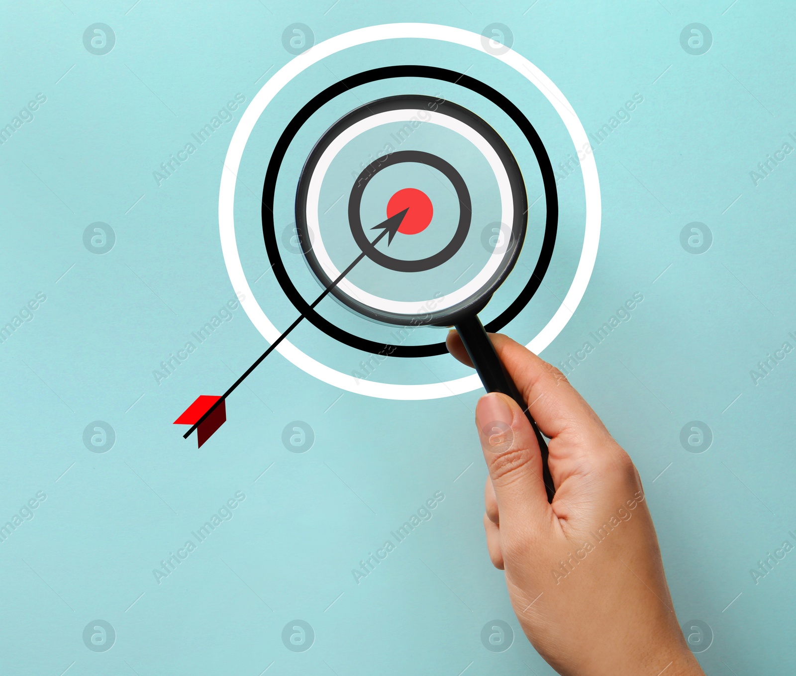 Image of Woman holding magnifying glass on light blue background, closeup. Illustration of target and arrow