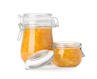 Photo of Jars of apricot jam isolated on white