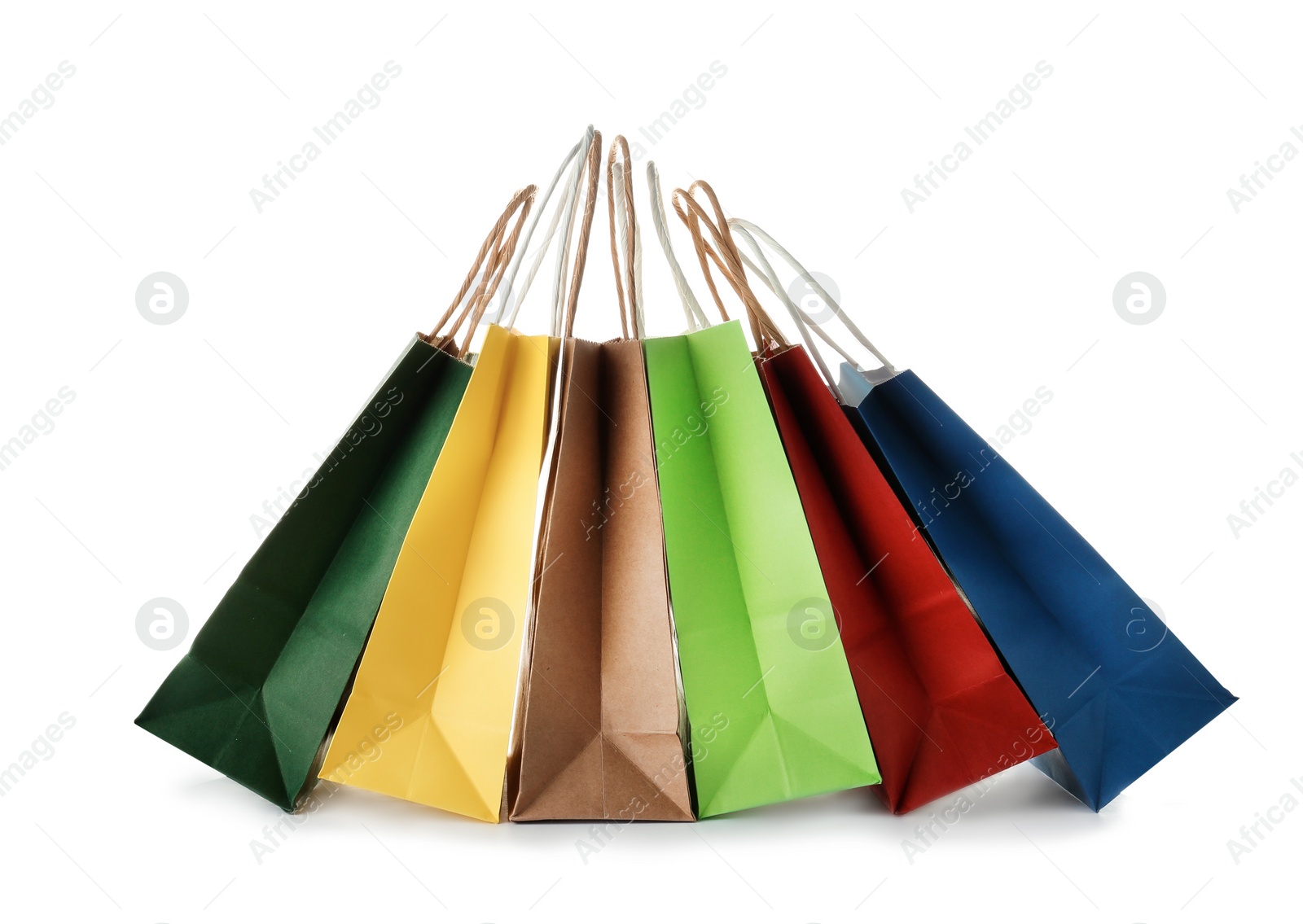 Photo of Empty paper shopping bags on white background