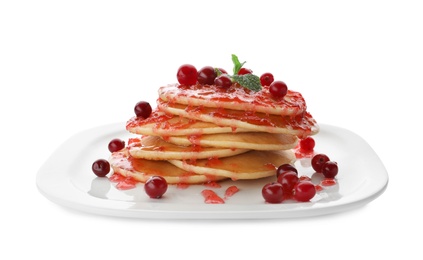 Photo of Plate with delicious pancakes on white background