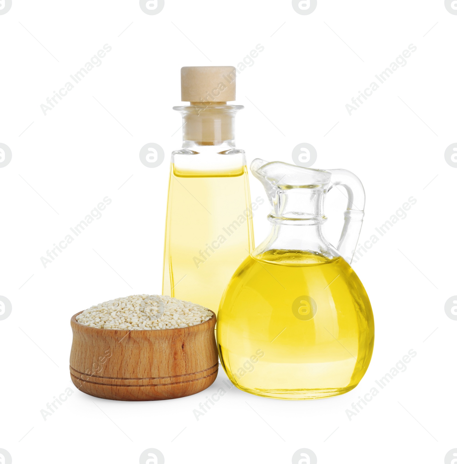 Photo of Fresh sesame oil and seeds isolated on white