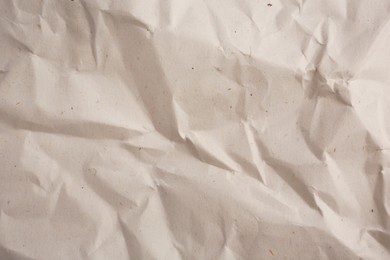 Texture of crumpled parchment paper as background, top view