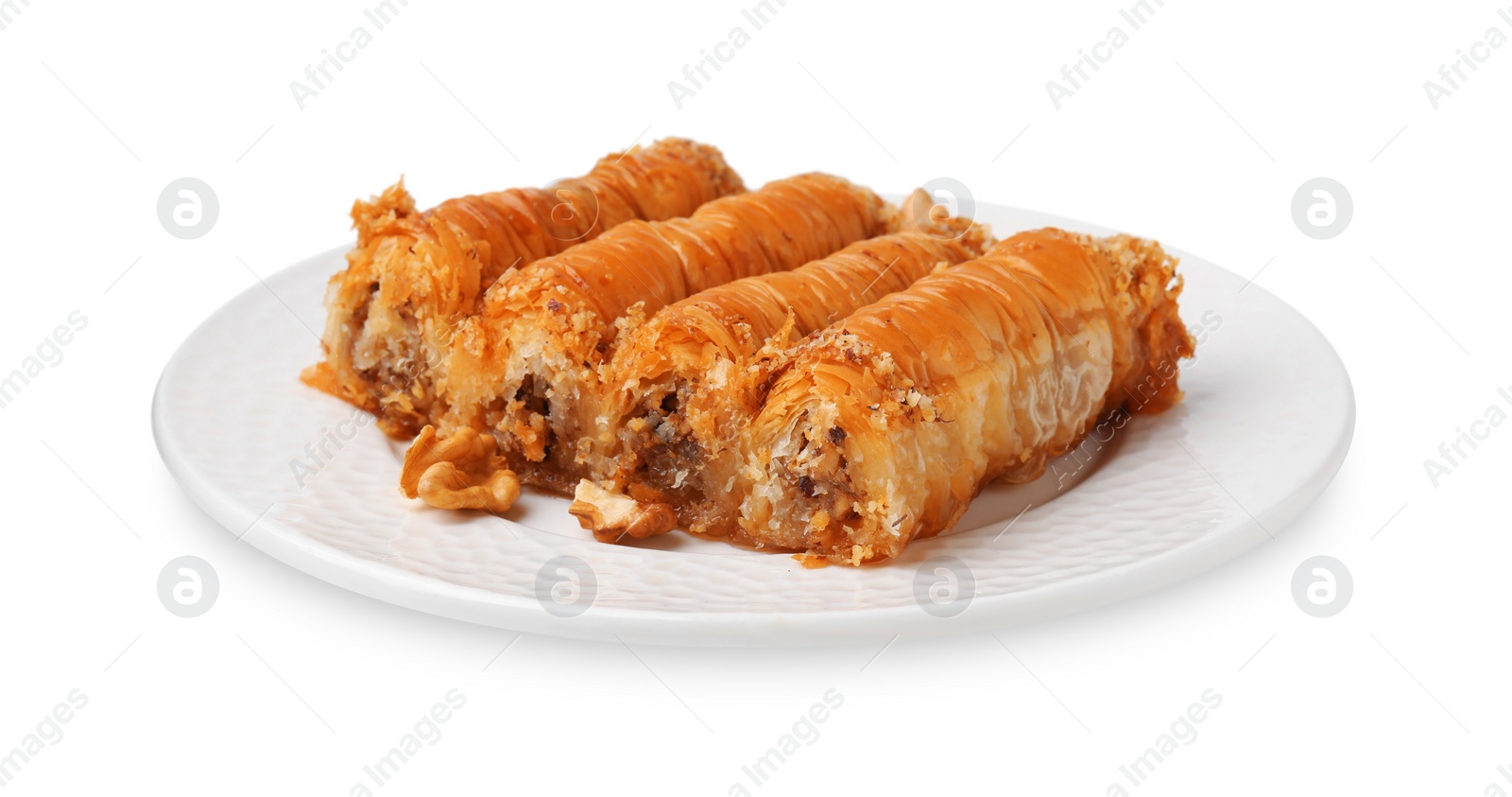 Photo of Eastern sweets. Pieces of tasty baklava isolated on white