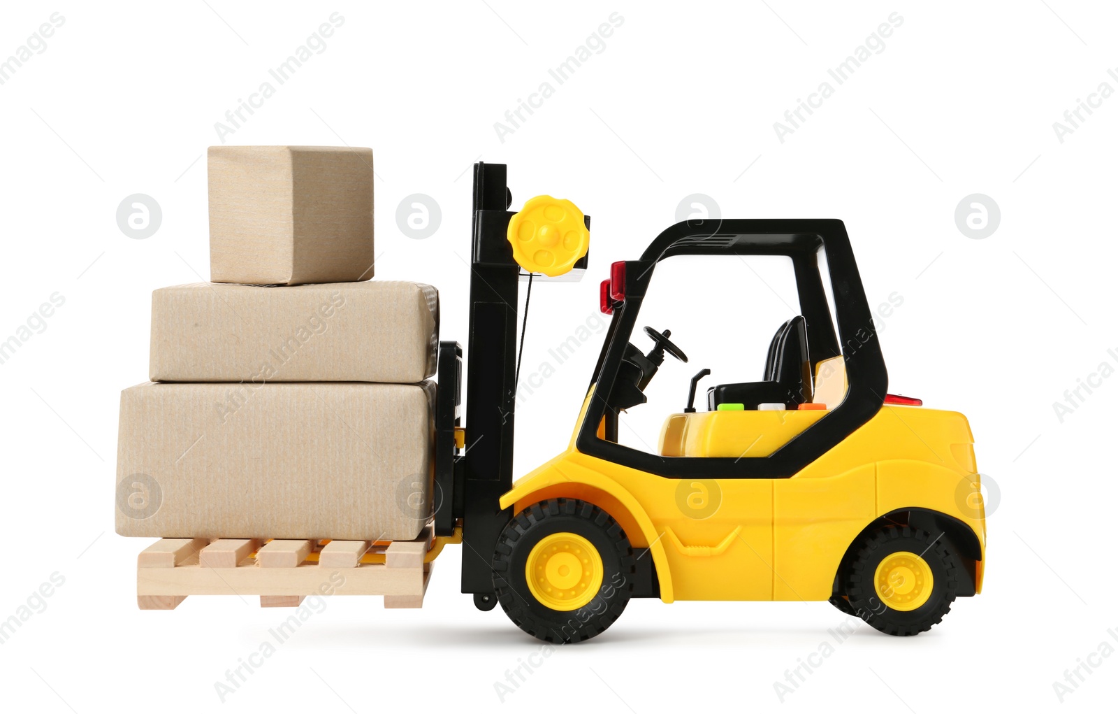 Photo of Toy forklift with wooden pallet and boxes on white background