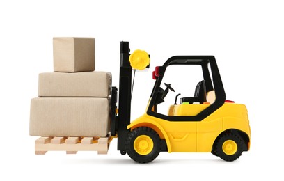 Photo of Toy forklift with wooden pallet and boxes on white background