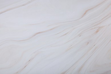 Photo of White marble surface as background, closeup view