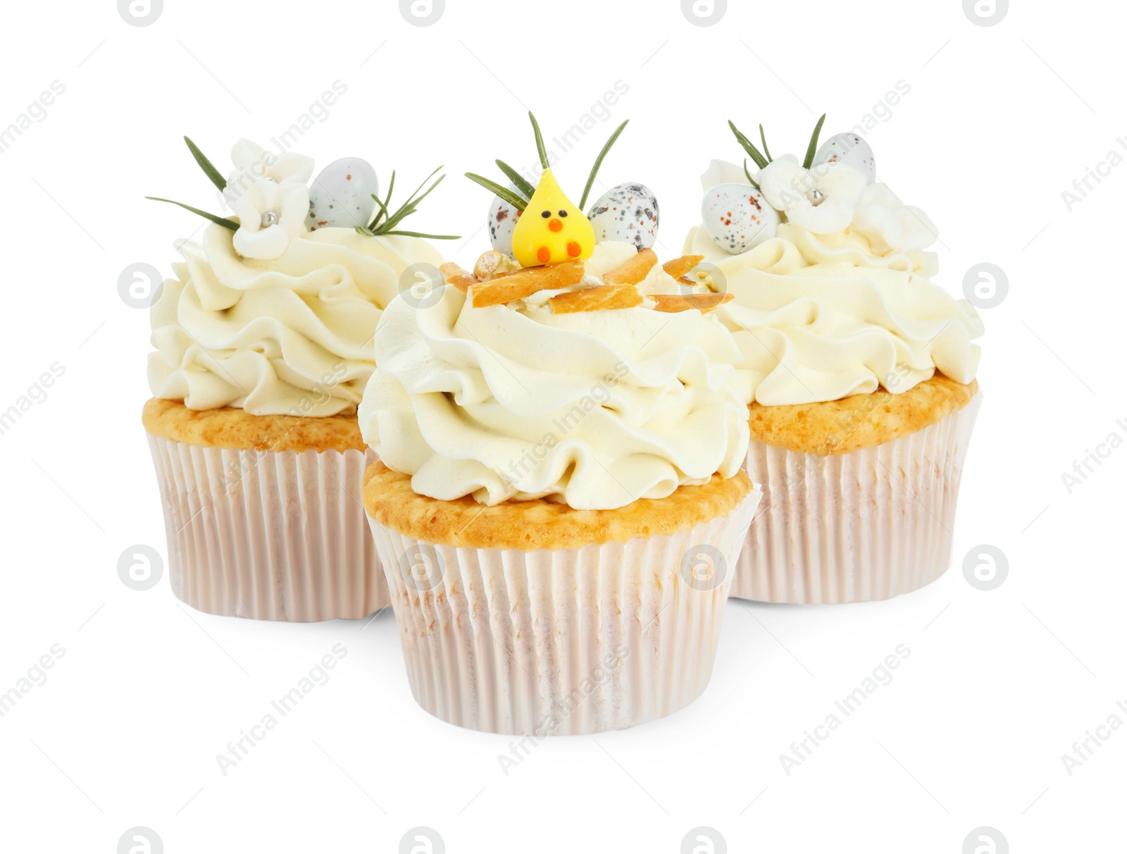 Photo of Tasty Easter cupcakes with vanilla cream isolated on white