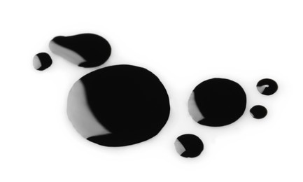 Blobs of black oil isolated on white