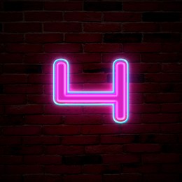 Image of Glowing neon number 4 sign on brick wall