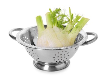 Photo of Metal colander with fennel isolated on white