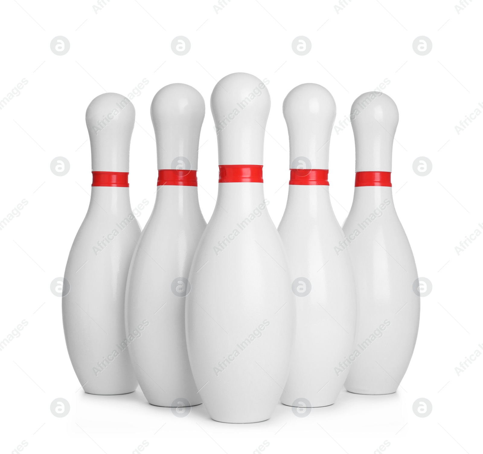 Photo of Bowling pins with red stripes isolated on white