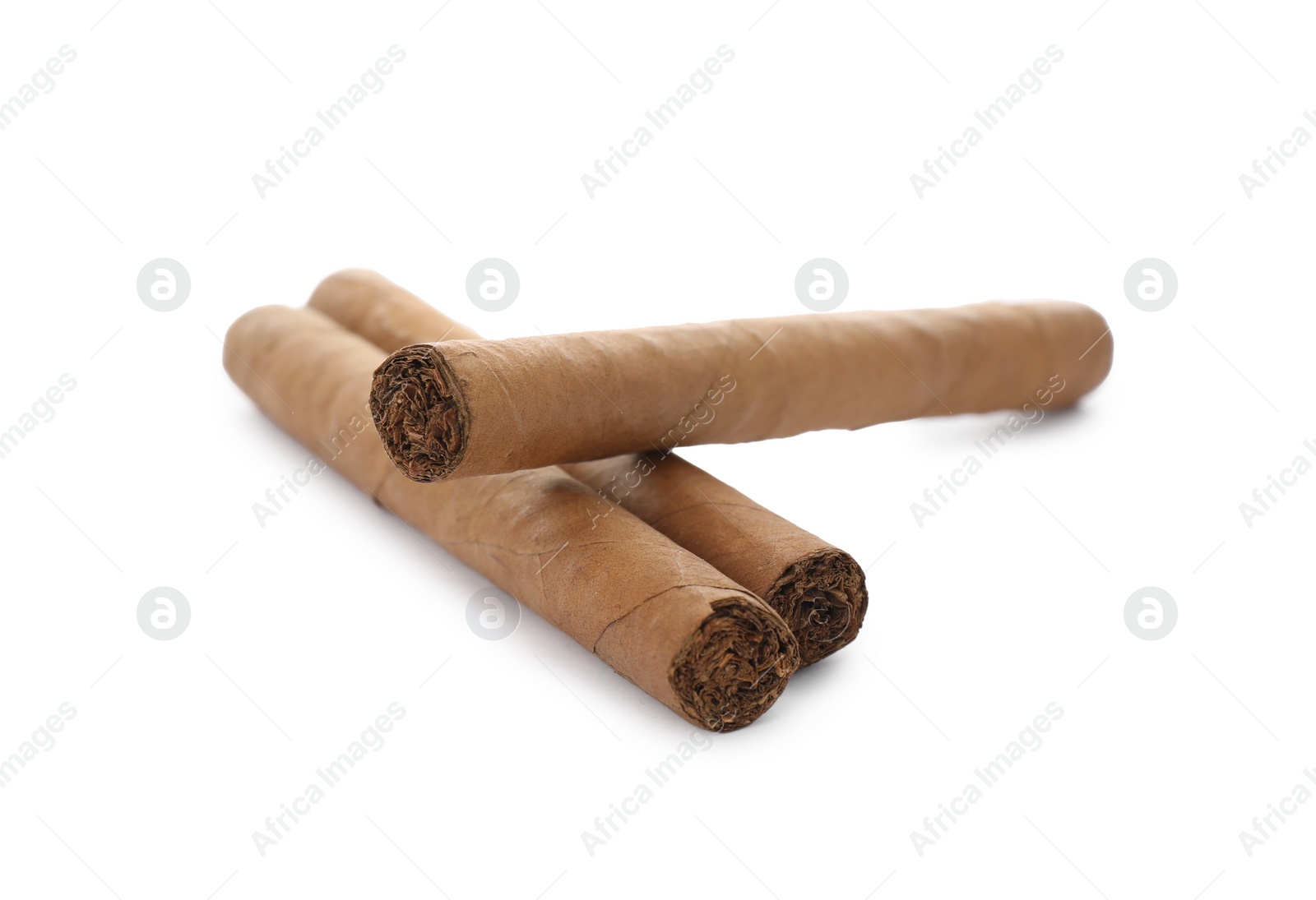 Photo of Cigars wrapped in tobacco leaves on white background