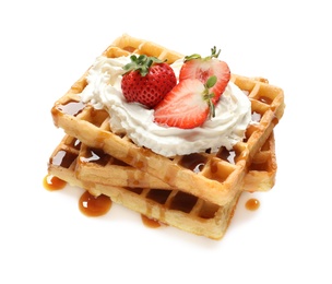 Photo of Yummy waffles with whipped cream, strawberries and caramel syrup on white background