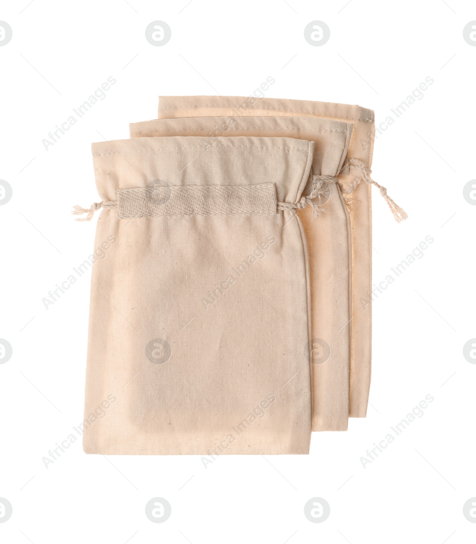 Photo of Cotton eco bags isolated on white, top view