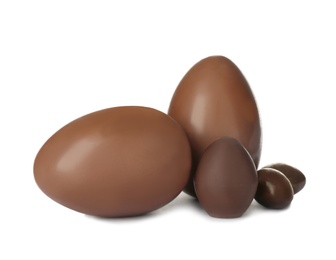 Photo of Tasty chocolate Easter eggs on white background