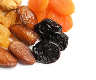 Different dried fruits on white background, top view. Healthy lifestyle