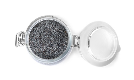 Photo of Poppy seeds in glass jar on white background, top view
