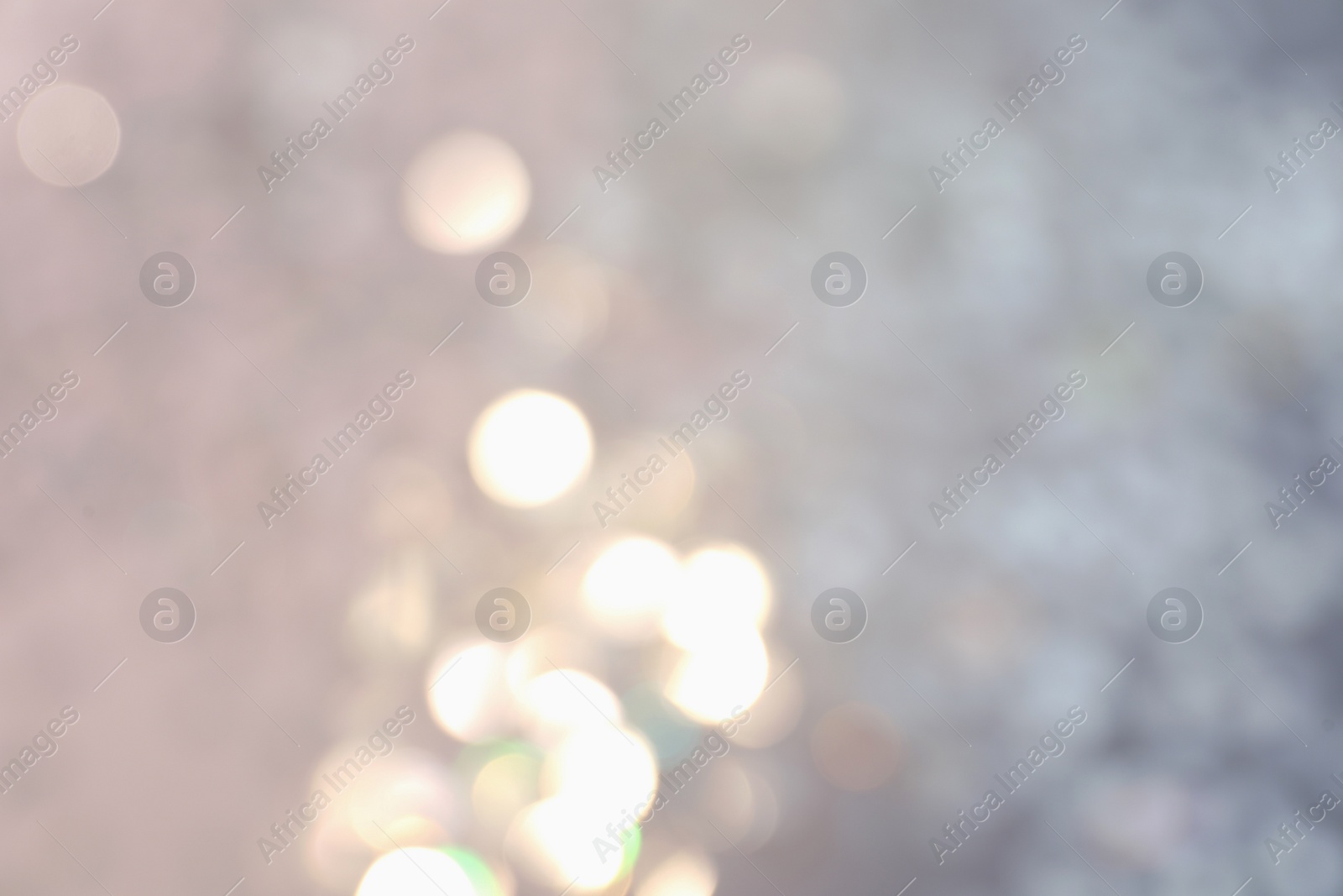 Photo of Shiny lilac background with magical bokeh effect