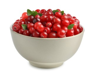 Photo of Bowl of fresh ripe cranberries with leaves isolated on white