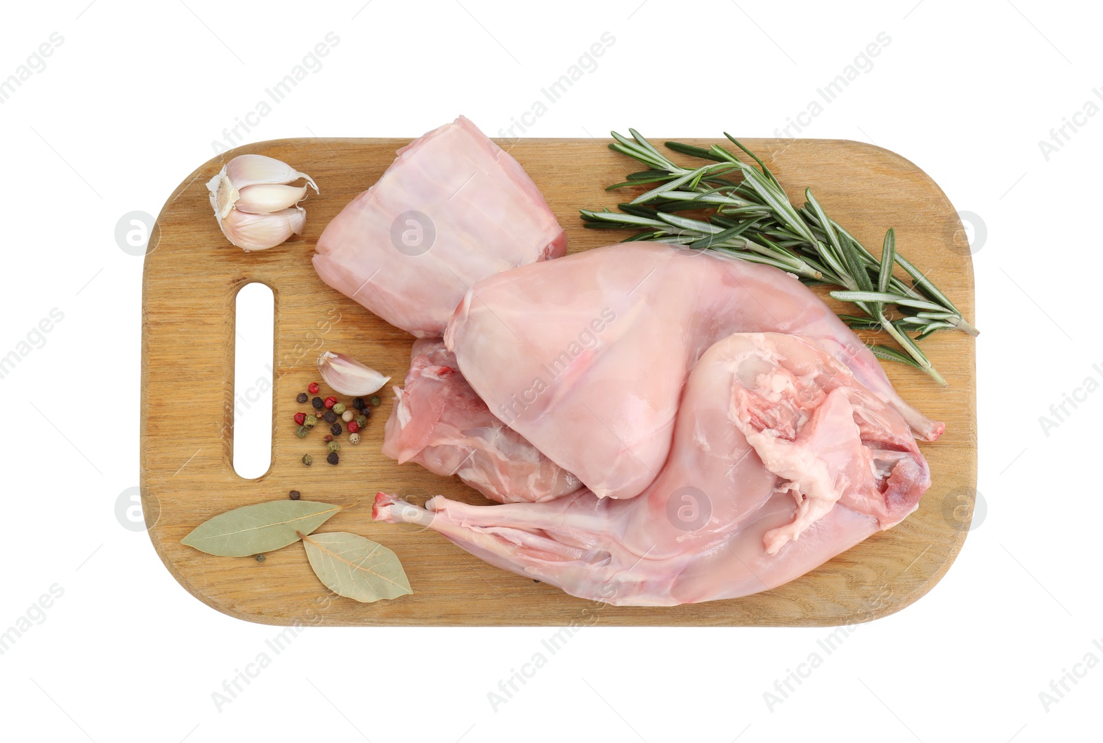 Photo of Fresh raw rabbit meat and spices isolated on white, top view
