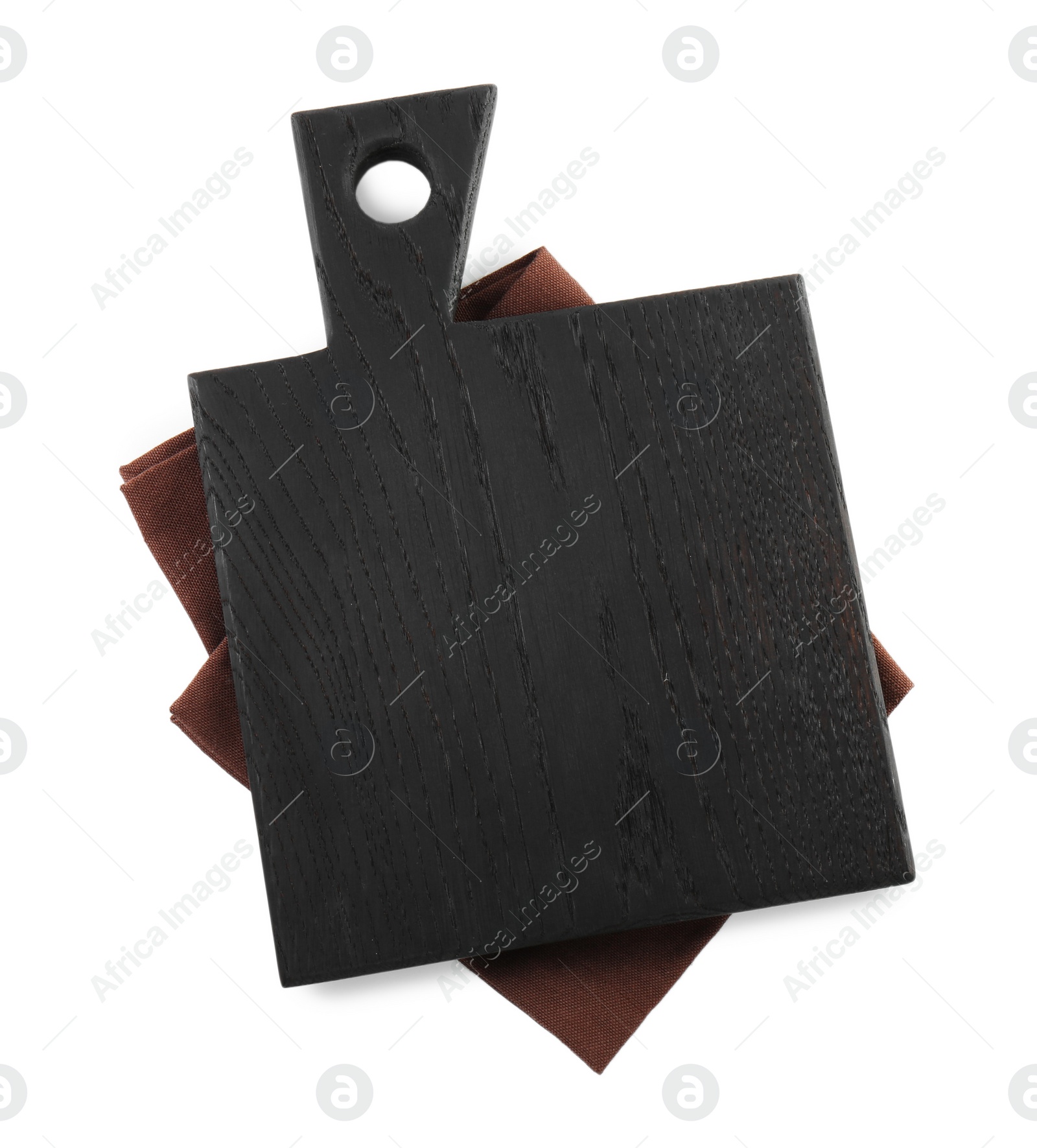 Photo of Black wooden cutting board and napkin isolated on white, top view