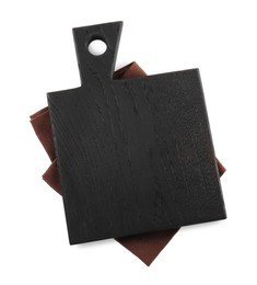 Black wooden cutting board and napkin isolated on white, top view