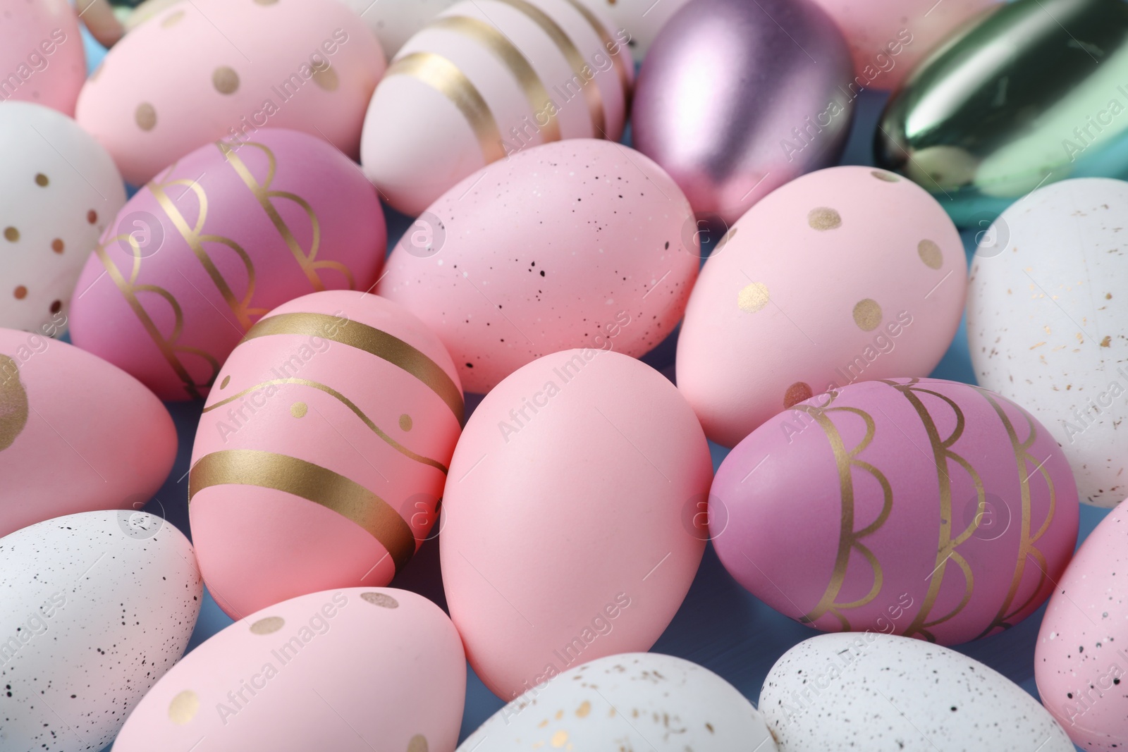 Photo of Many beautifully decorated Easter eggs as background, closeup